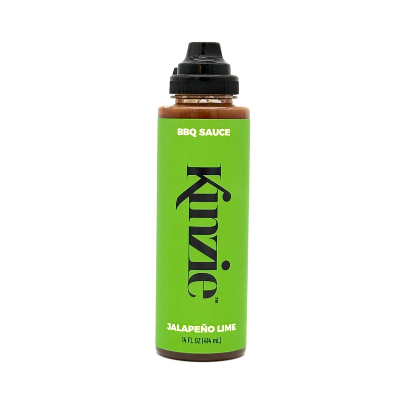 Bottle of Kinzie Jalapeño Lime BBQ Sauce on a white background